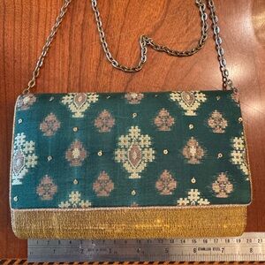 Green and gold embroidered purse